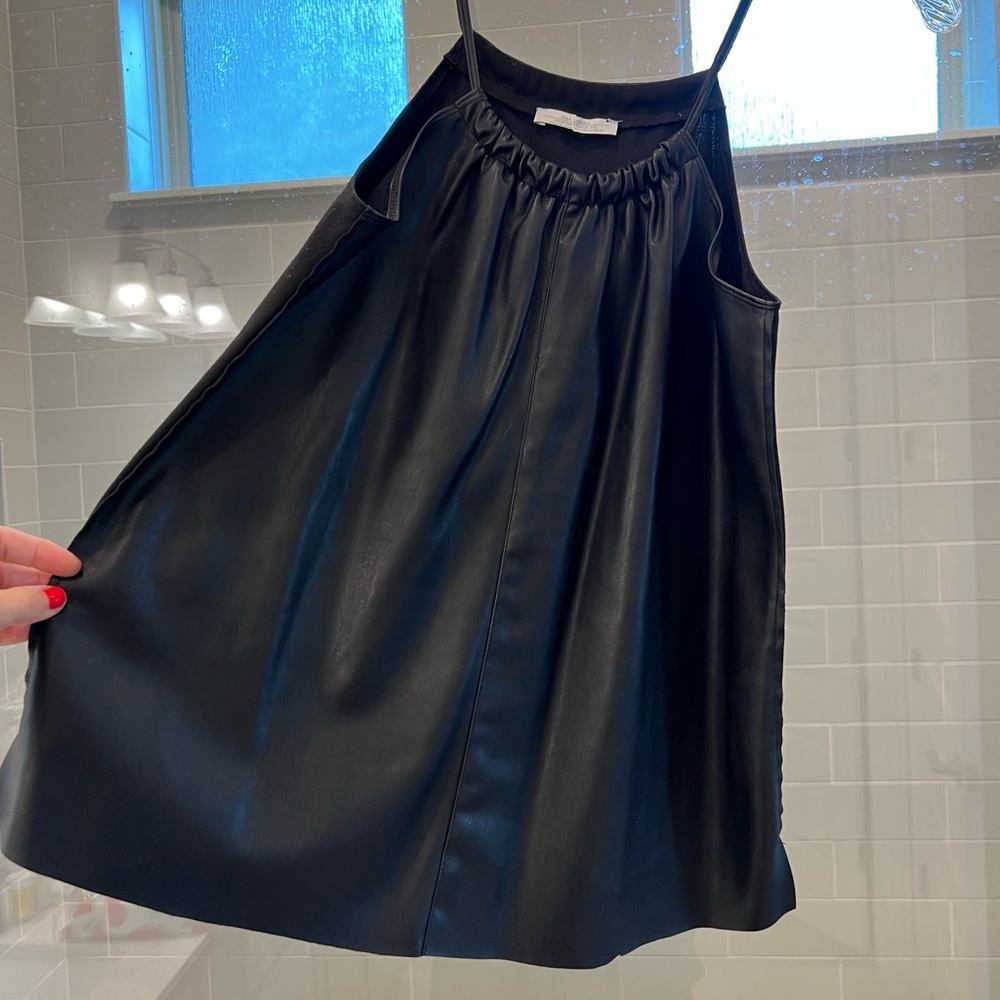 Black faux leather top